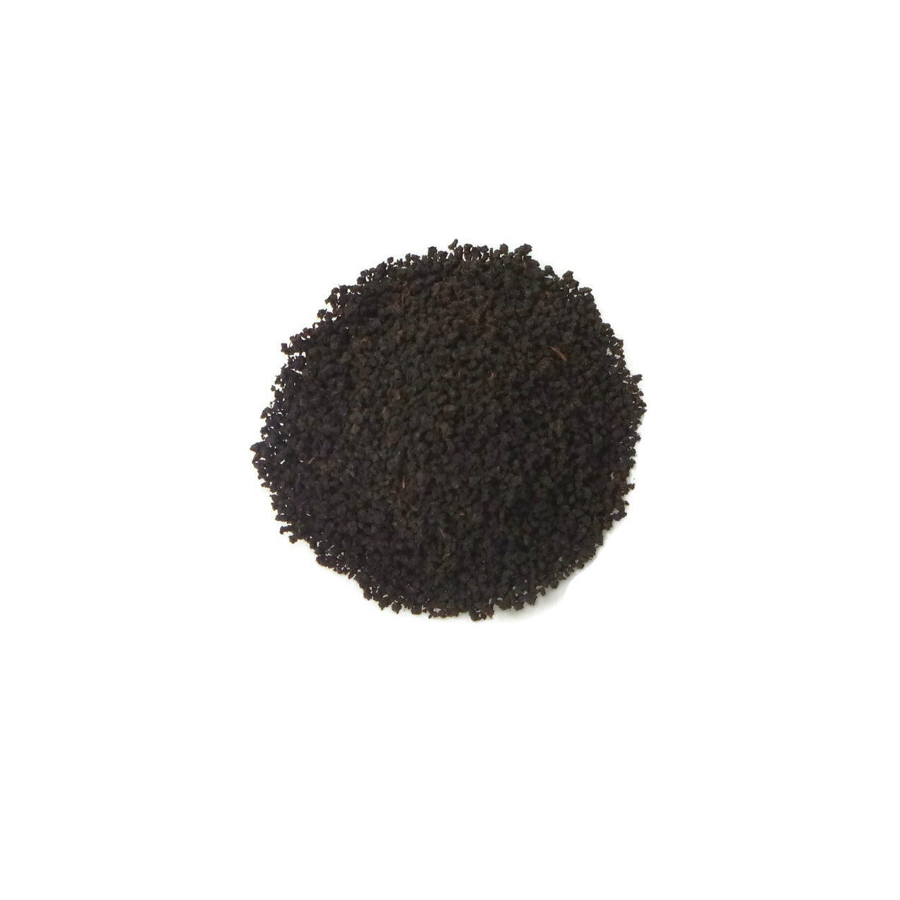 black loose leaf tea on a white background