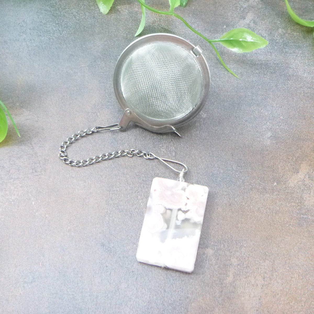 Tea infuser with cherry blossom agate charm