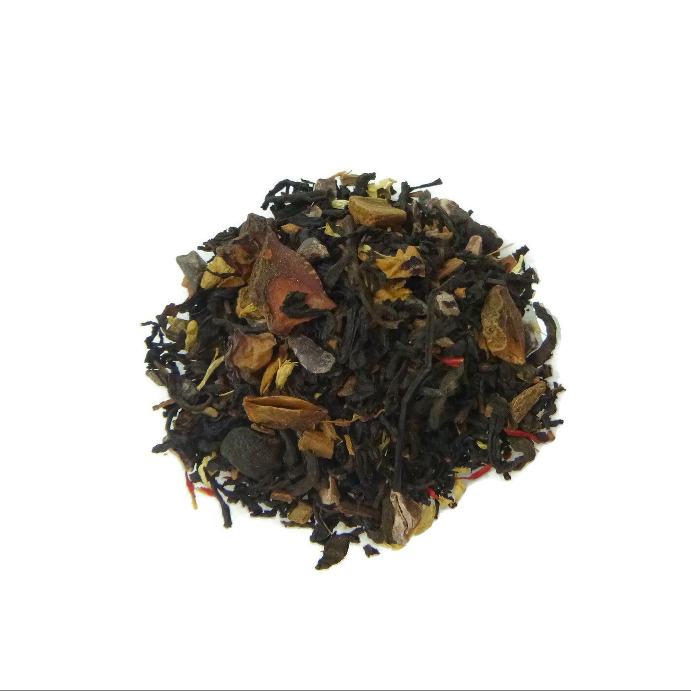 Assorted dried tea leaves on a white background