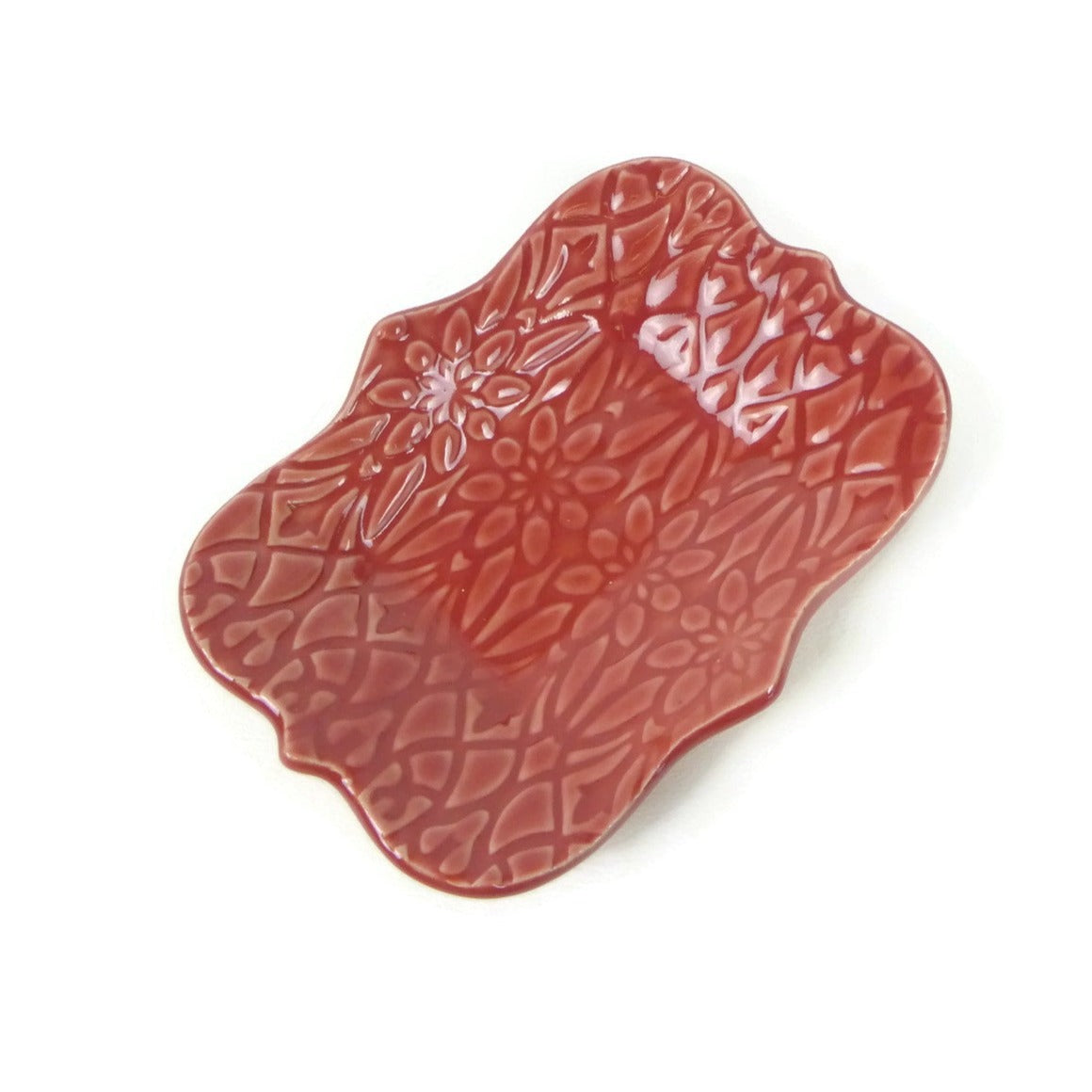 Large Red Scalloped Trivet with Geofloral Texture