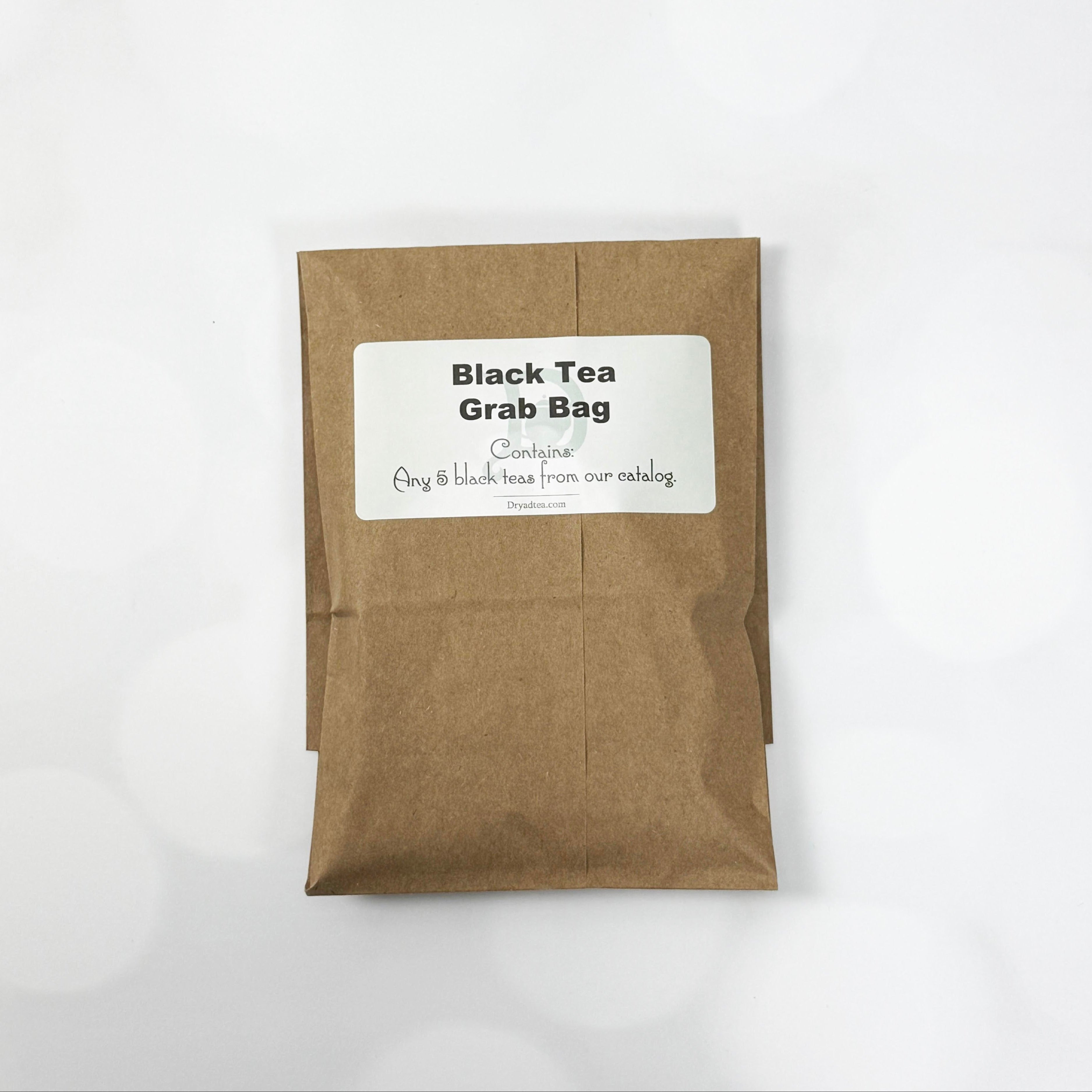 Brown paper bag with a label for black tea grab bag on a white background