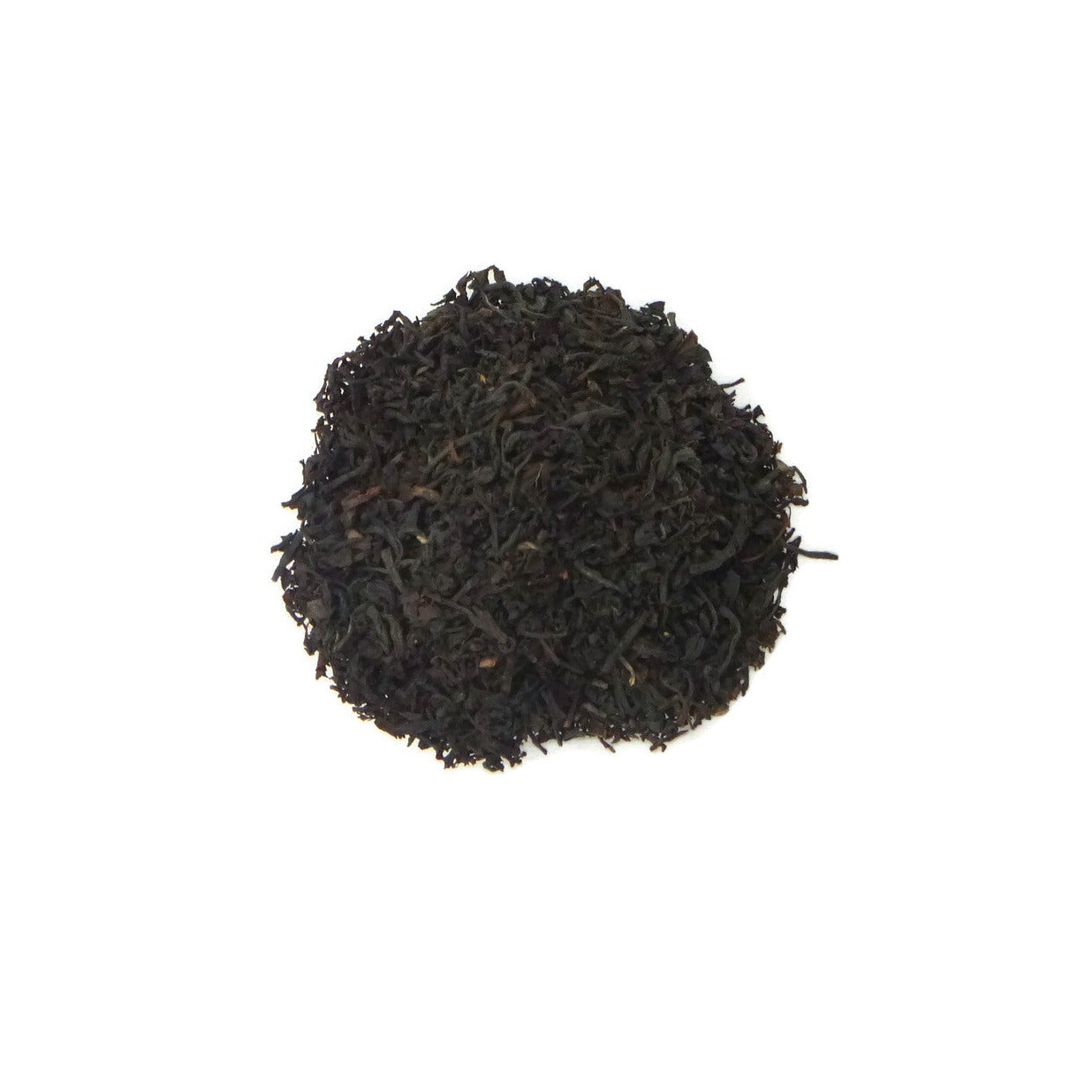 Dry black tea leaves on a white background