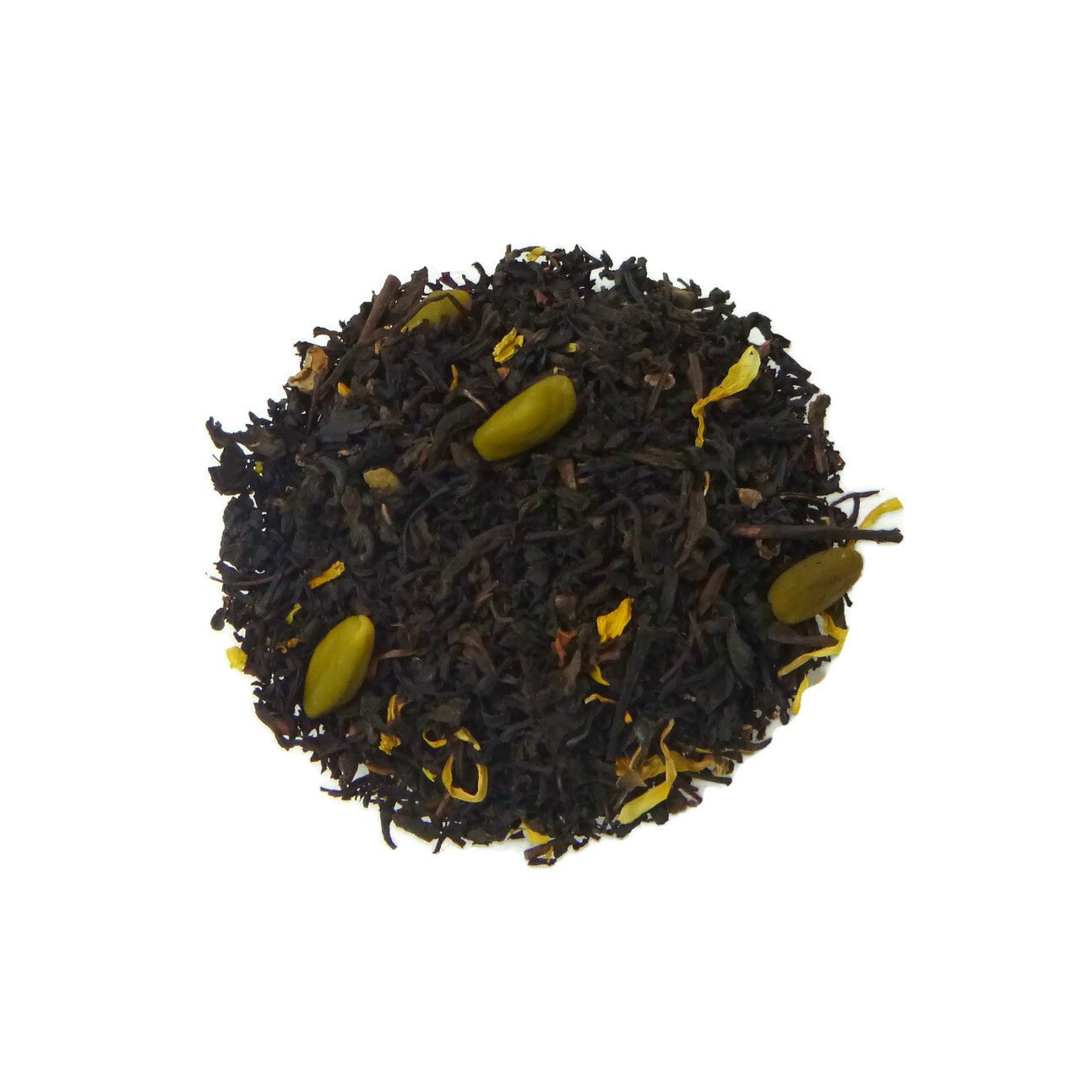 Tea leaves with green pistachio nuts on a white background